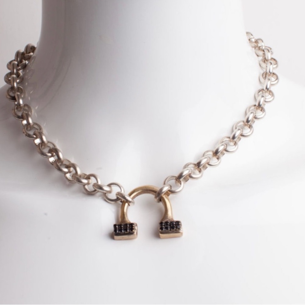Silver oxidized chain and brass pendant with black Swarovski crystal.